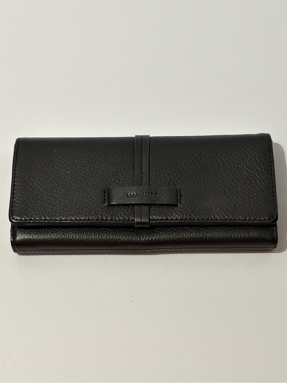 Hammitt Benjamin Wallet Slim in black leather with gunmetal hardware.